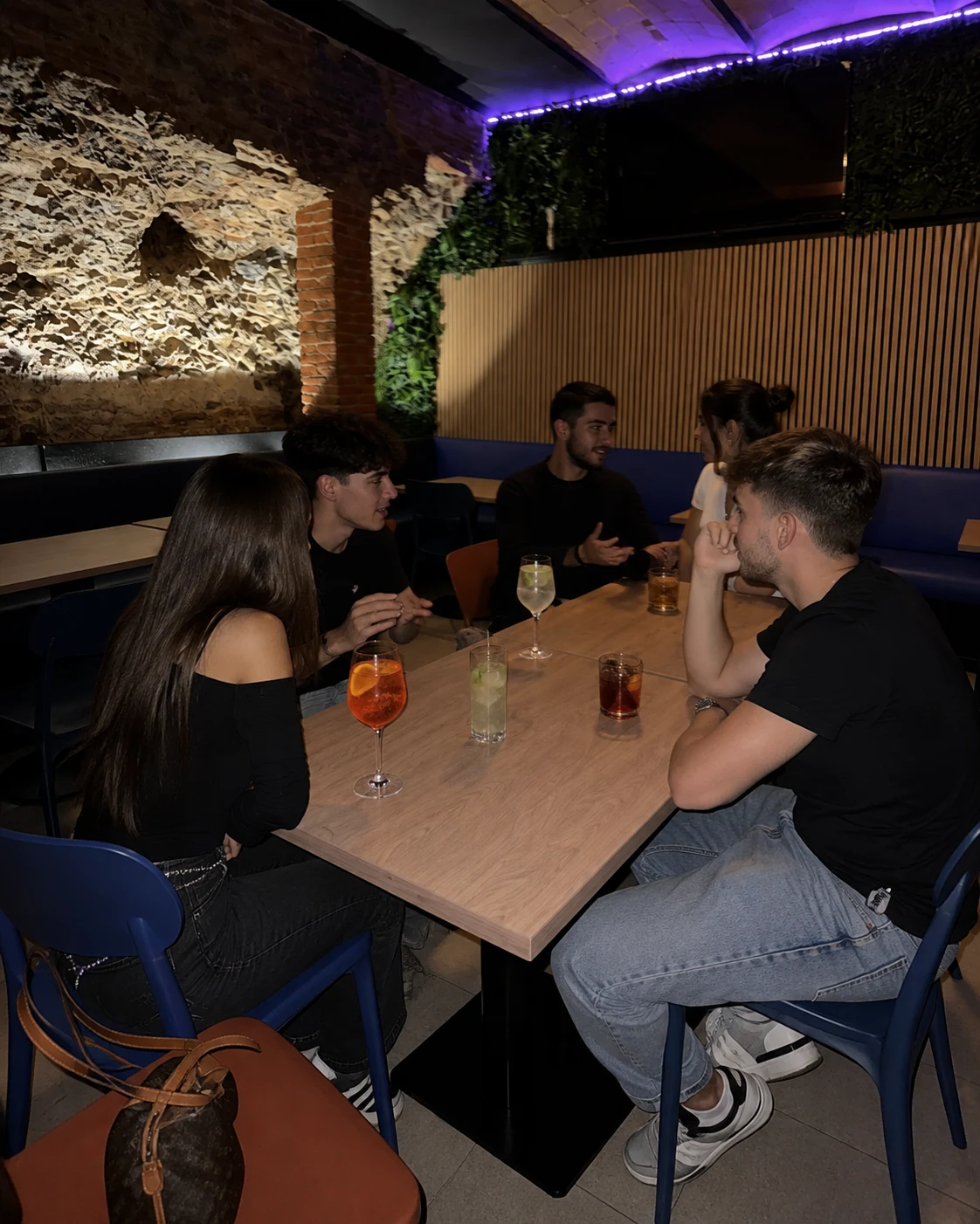 Editorial scene of friends at Jimmy Cocktail Lab.