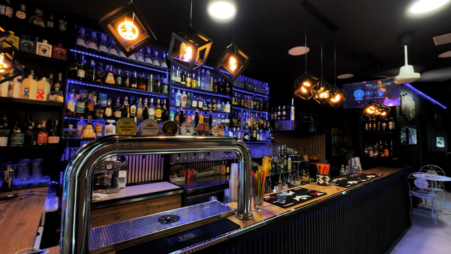 Jimmy’s bar and bottle wall on Via Petroni, Bologna